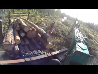 Урал лесовоз Приборка делянки манипулятором Атлант С-90